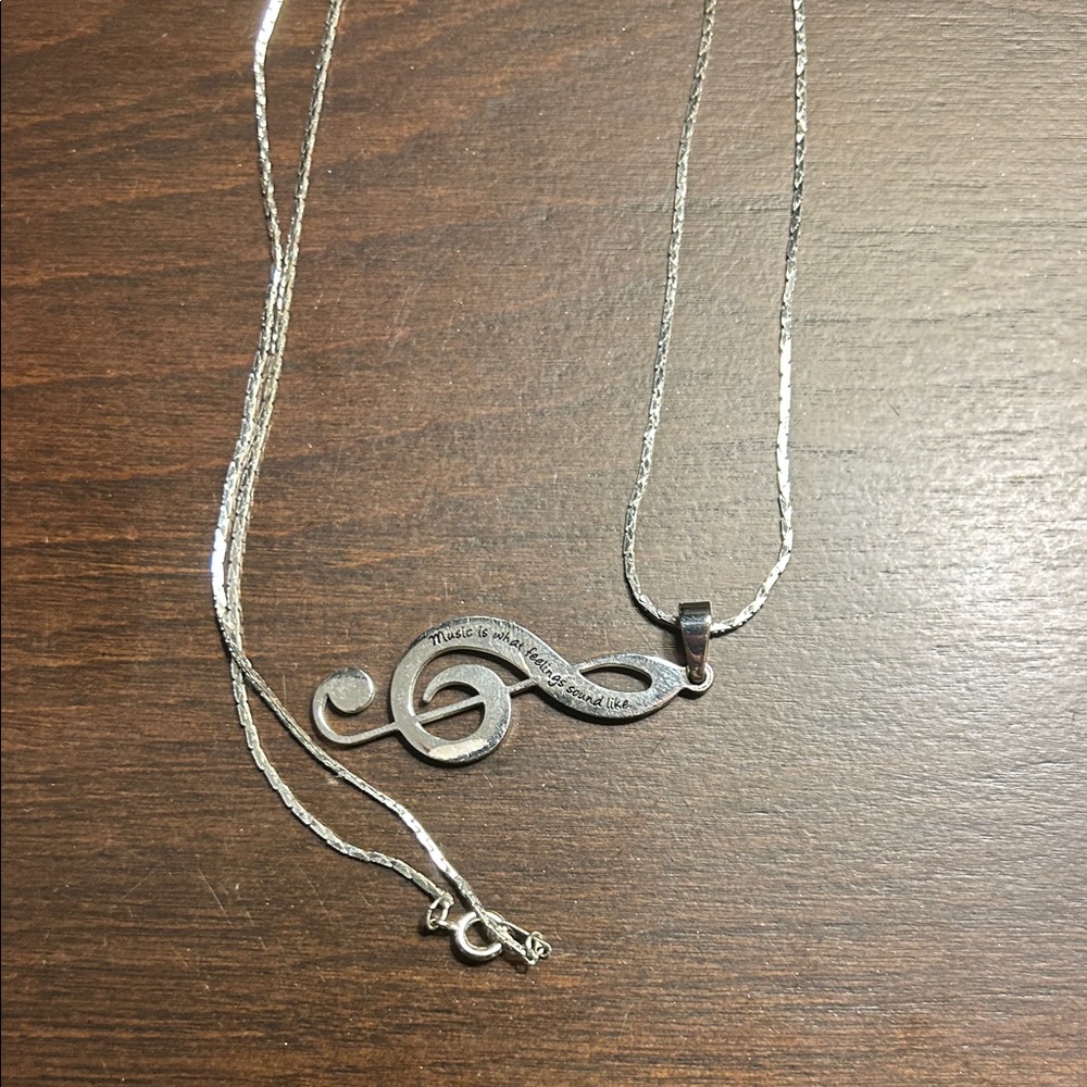 Elegant Silver Treble Clef Necklace